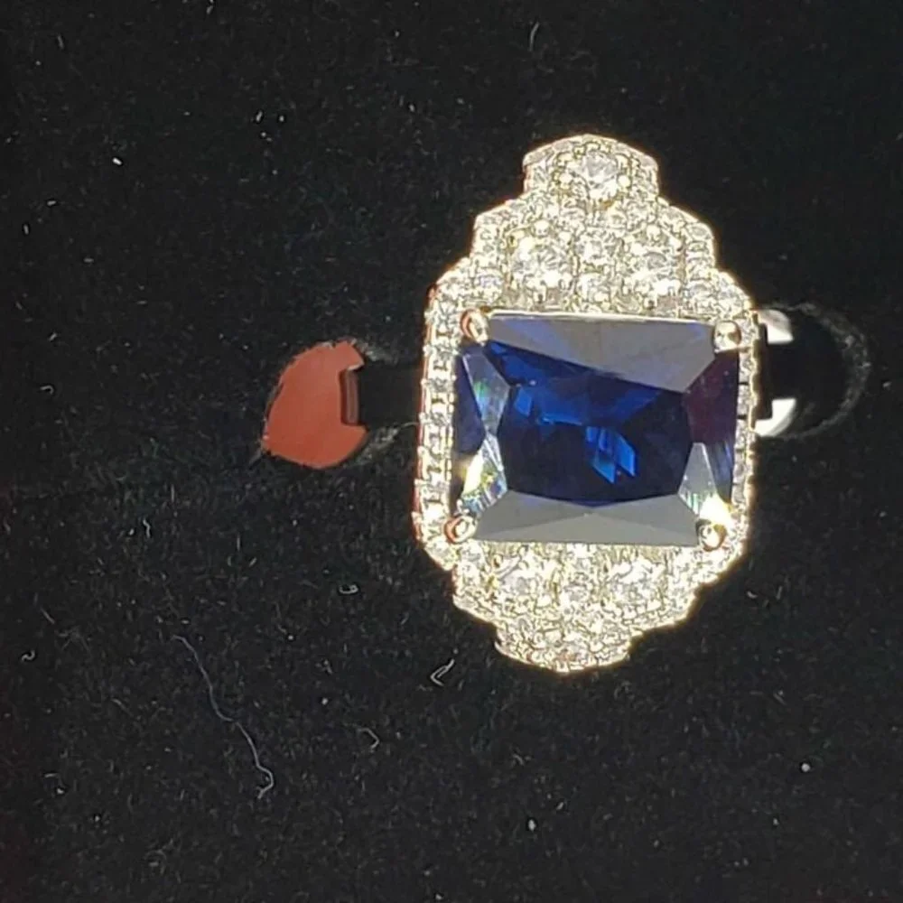 Brand New 18k White Gold Plated ring with cubic zirconia stones & blue gemstone